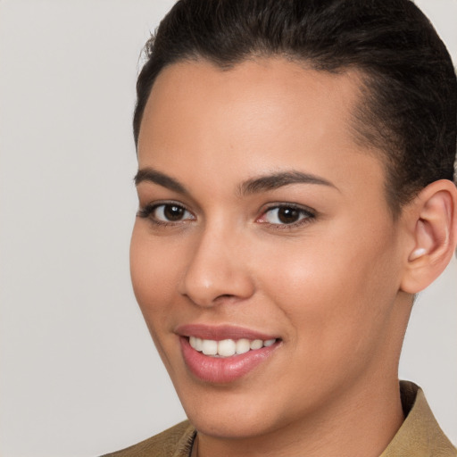 Joyful white young-adult female with short  brown hair and brown eyes