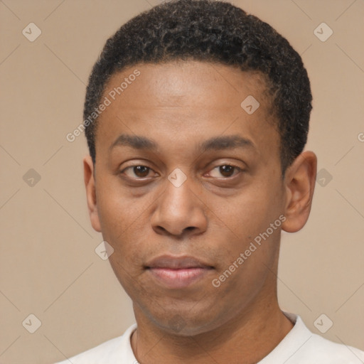 Neutral latino young-adult male with short  black hair and brown eyes