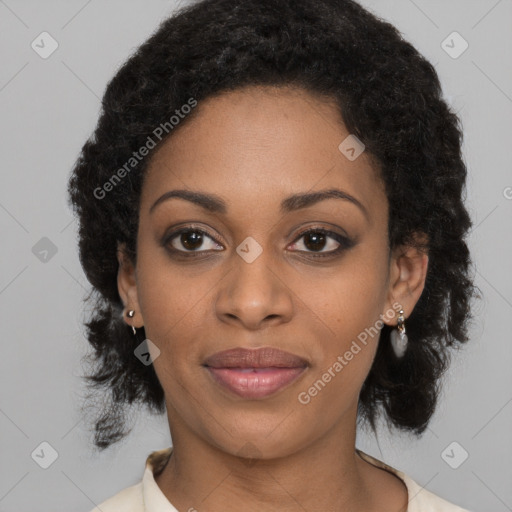 Joyful black young-adult female with medium  black hair and brown eyes