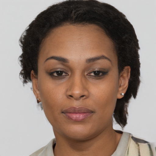 Neutral black adult female with short  brown hair and brown eyes