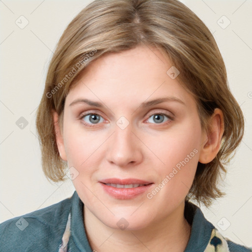 Joyful white young-adult female with medium  brown hair and blue eyes