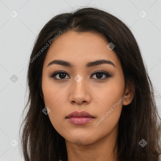 Neutral latino young-adult female with long  brown hair and brown eyes