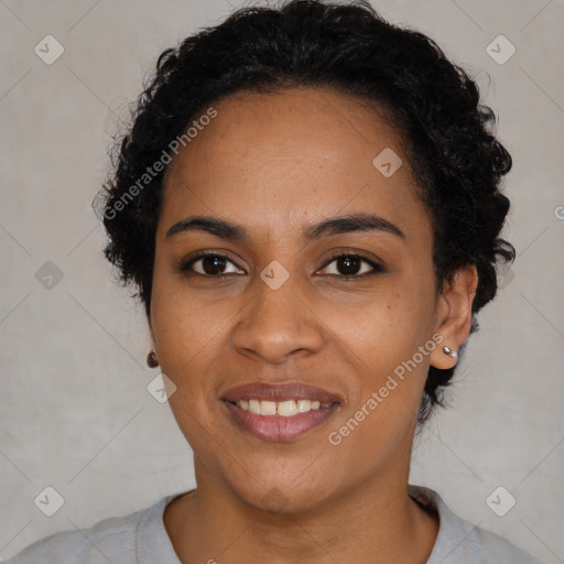 Joyful black young-adult female with medium  black hair and brown eyes