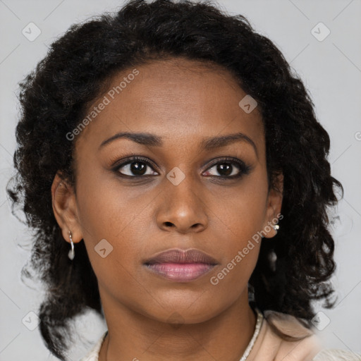 Neutral black young-adult female with medium  brown hair and brown eyes