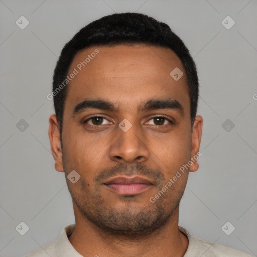 Neutral latino young-adult male with short  black hair and brown eyes