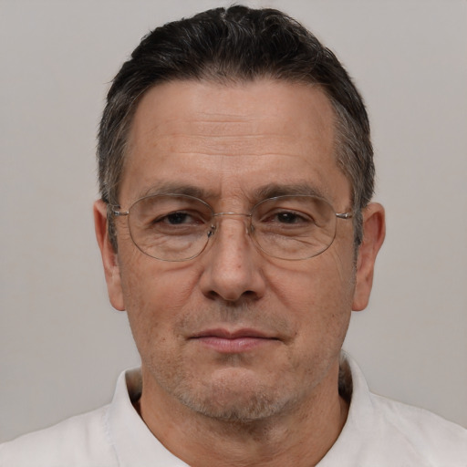 Neutral white middle-aged male with short  brown hair and brown eyes