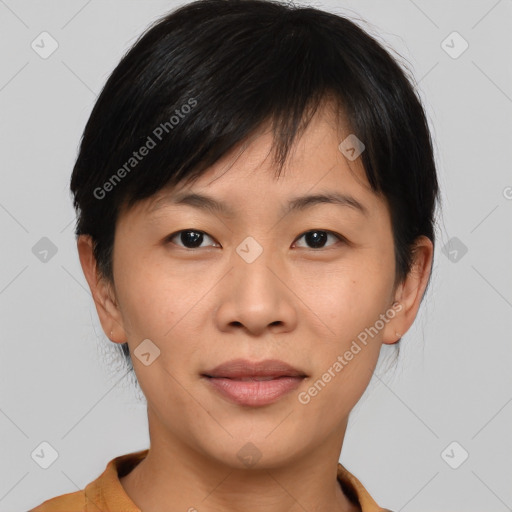 Joyful asian young-adult female with short  brown hair and brown eyes