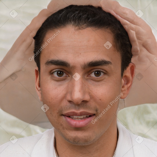 Joyful white young-adult male with short  brown hair and brown eyes