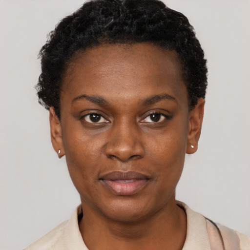 Neutral black young-adult female with short  black hair and brown eyes
