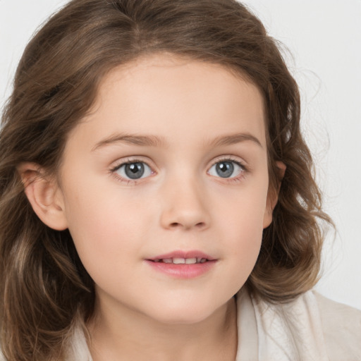 Joyful white child female with medium  brown hair and brown eyes