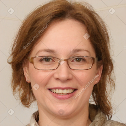 Joyful white adult female with medium  brown hair and blue eyes