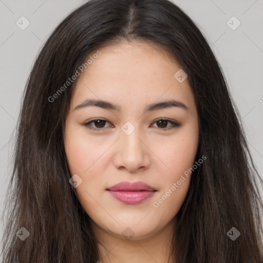 Joyful asian young-adult female with long  brown hair and brown eyes