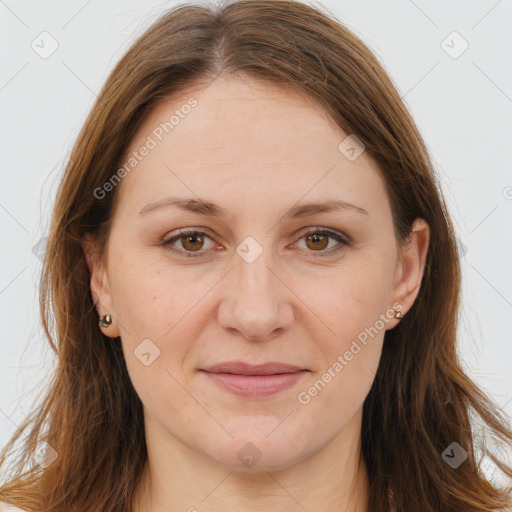 Joyful white adult female with long  brown hair and brown eyes