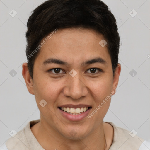 Joyful latino young-adult male with short  brown hair and brown eyes