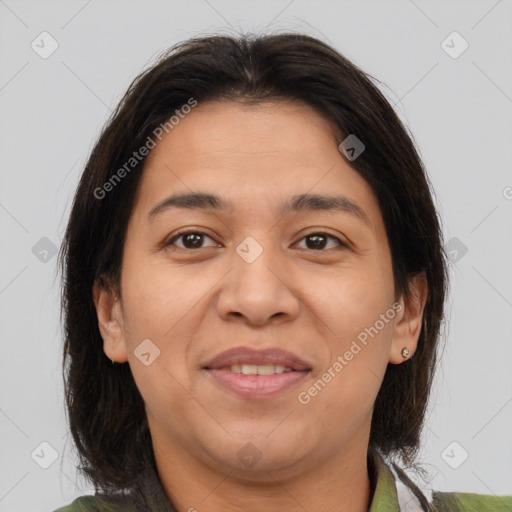 Joyful white adult female with medium  brown hair and brown eyes