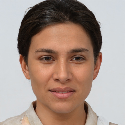 Joyful white young-adult female with short  brown hair and brown eyes
