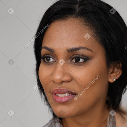 Joyful black young-adult female with medium  black hair and brown eyes