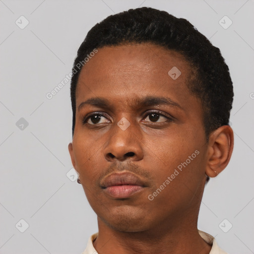 Neutral black young-adult male with short  black hair and brown eyes