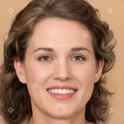 Joyful white young-adult female with medium  brown hair and green eyes