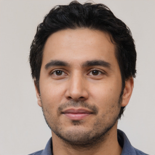 Neutral latino young-adult male with short  black hair and brown eyes