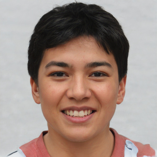 Joyful asian young-adult female with short  black hair and brown eyes