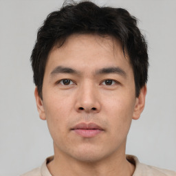 Neutral asian young-adult male with short  brown hair and brown eyes