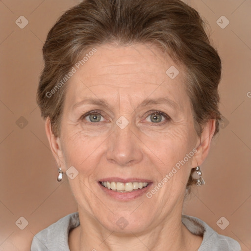 Joyful white adult female with short  brown hair and brown eyes