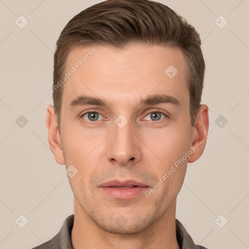 Joyful white young-adult male with short  brown hair and brown eyes