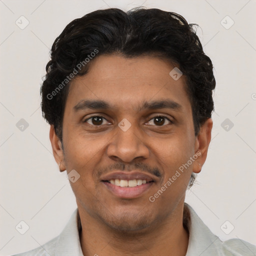 Joyful black young-adult male with short  black hair and brown eyes