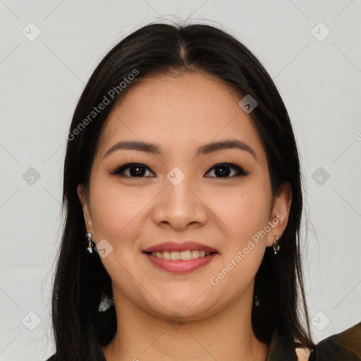 Joyful latino young-adult female with long  brown hair and brown eyes