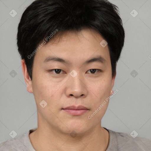 Neutral asian young-adult male with short  brown hair and brown eyes