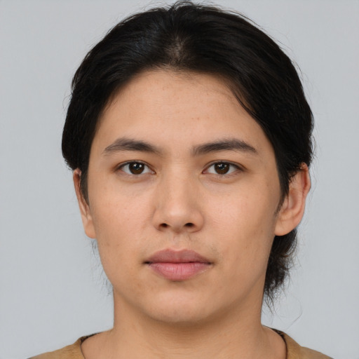 Neutral asian young-adult male with short  brown hair and brown eyes