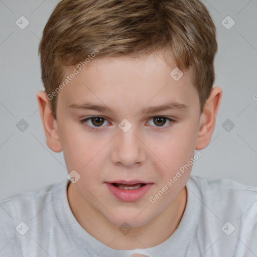 Joyful white child male with short  brown hair and brown eyes