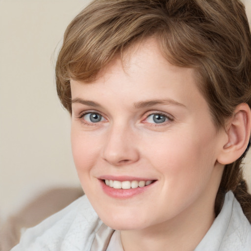 Joyful white young-adult female with medium  brown hair and blue eyes