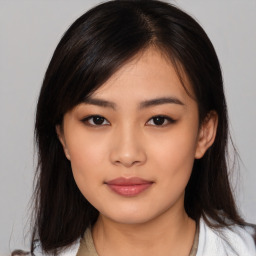 Neutral asian young-adult female with medium  black hair and brown eyes