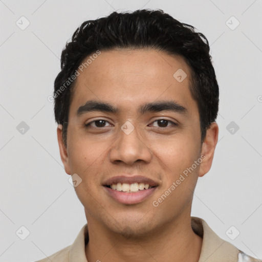 Joyful latino young-adult male with short  black hair and brown eyes