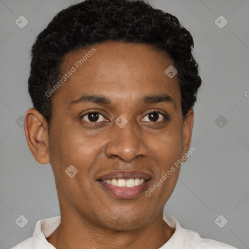 Joyful latino young-adult male with short  brown hair and brown eyes