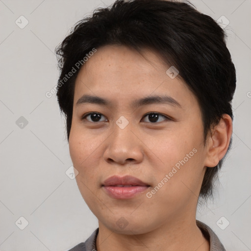 Joyful asian young-adult female with short  brown hair and brown eyes