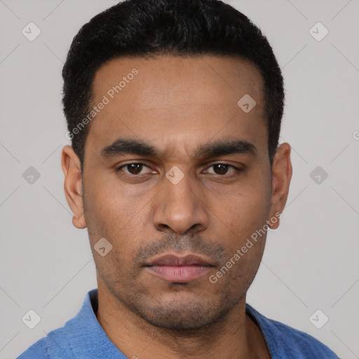 Neutral latino young-adult male with short  black hair and brown eyes