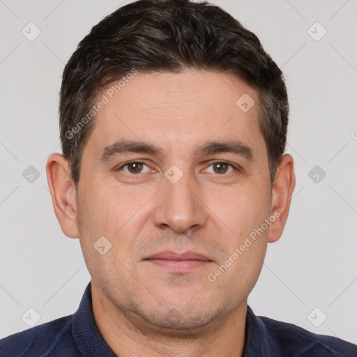 Joyful white adult male with short  brown hair and brown eyes