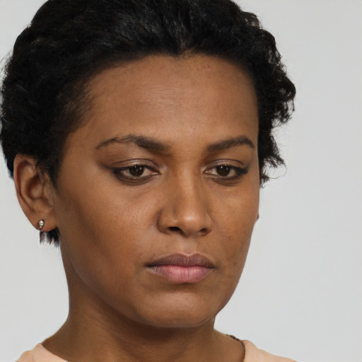 Neutral black young-adult female with short  brown hair and brown eyes