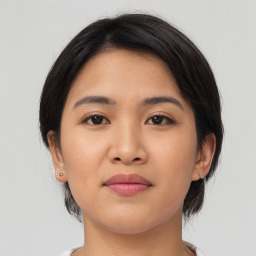 Neutral asian young-adult female with medium  black hair and brown eyes