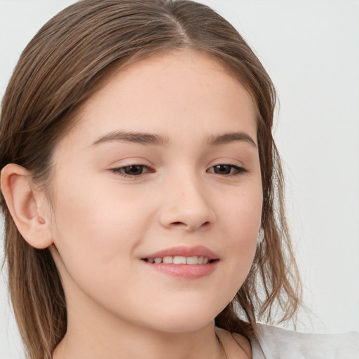 Joyful white child female with long  brown hair and brown eyes