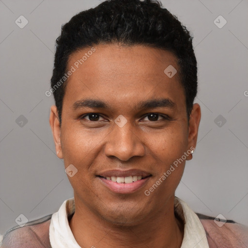 Joyful black young-adult male with short  black hair and brown eyes