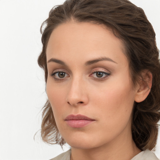 Neutral white young-adult female with medium  brown hair and brown eyes