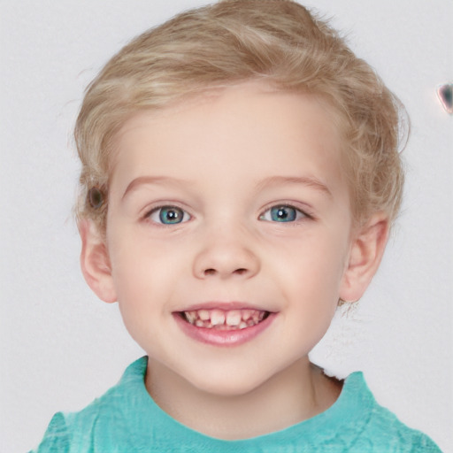 Joyful white child female with short  brown hair and blue eyes