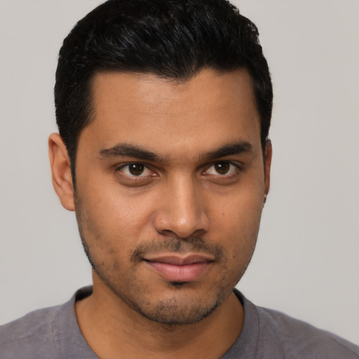 Neutral latino young-adult male with short  black hair and brown eyes