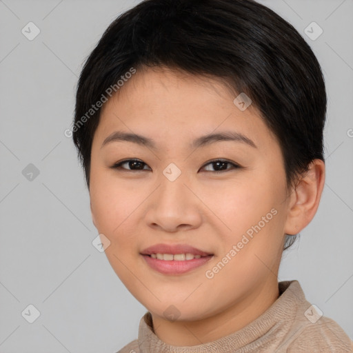 Joyful asian young-adult female with short  brown hair and brown eyes