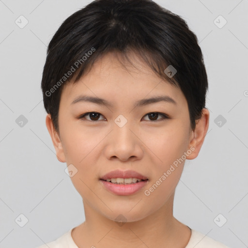 Joyful asian young-adult female with short  brown hair and brown eyes