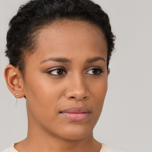 Neutral latino young-adult female with short  brown hair and brown eyes